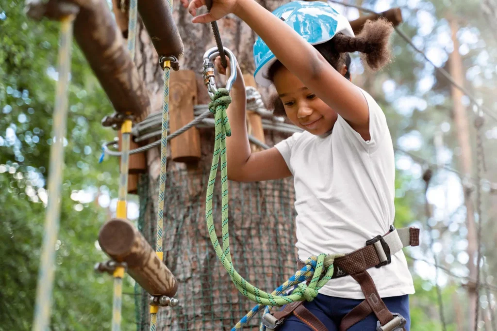 girl having fun on a high ropes