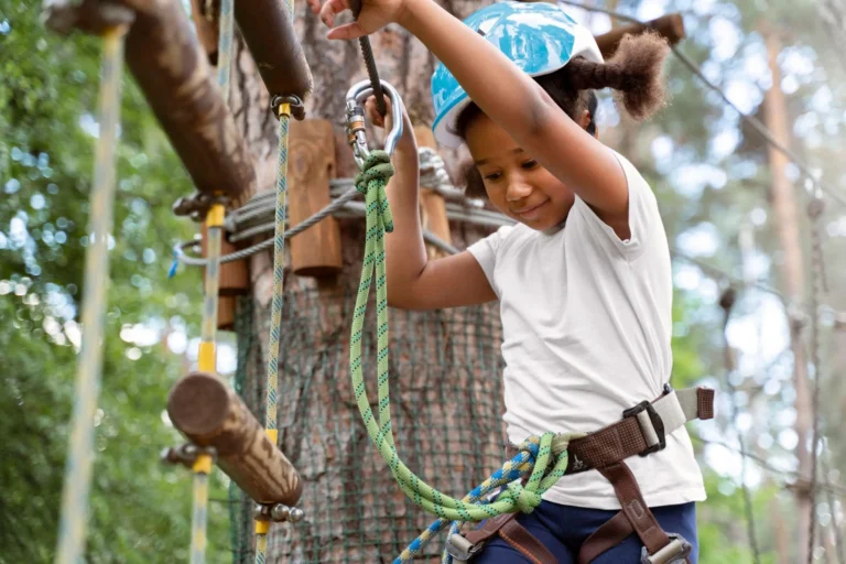 girl having fun on a high ropes